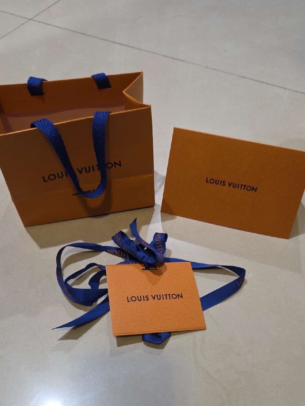Louis Vuitton Orange Gift Bag Set with Blue Ribbon Accents